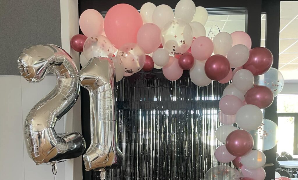an image of a 21st ballon garlon in the Main Function Room of Tangiteroria Community Complex