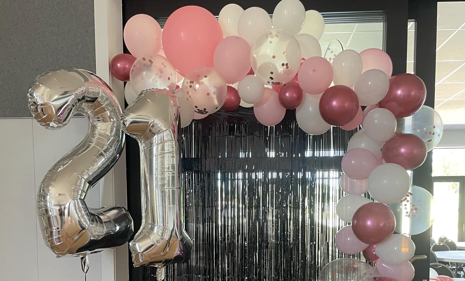 an image of a 21st ballon garlon in the Main Function Room of Tangiteroria Community Complex
